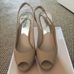 Michael Kors Patent Peep Toe Pumps.